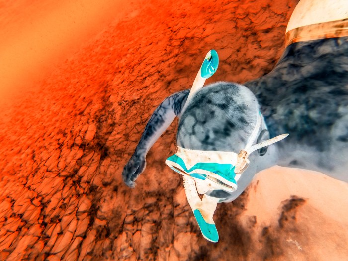 Infrared photo of young adult man underwater