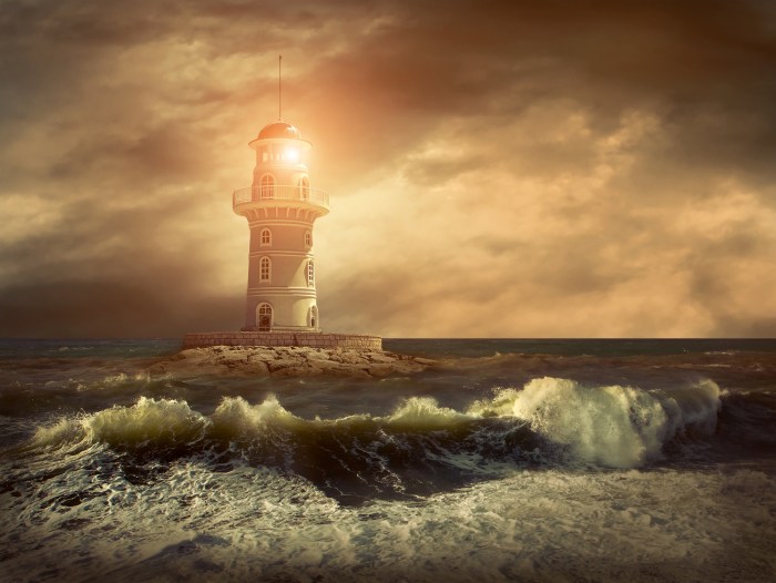 Lighthouse on the sea under sky